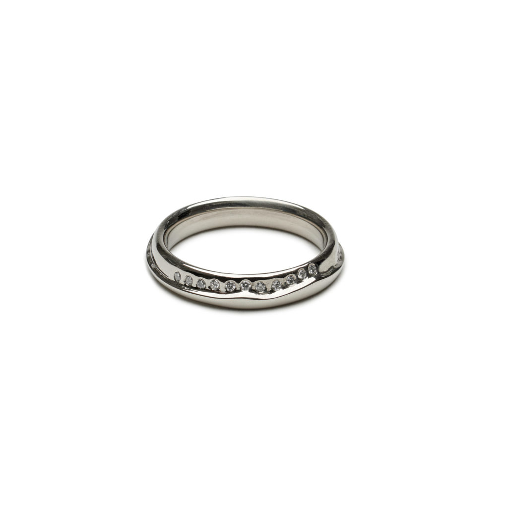 Silver mountain range ring with diamond