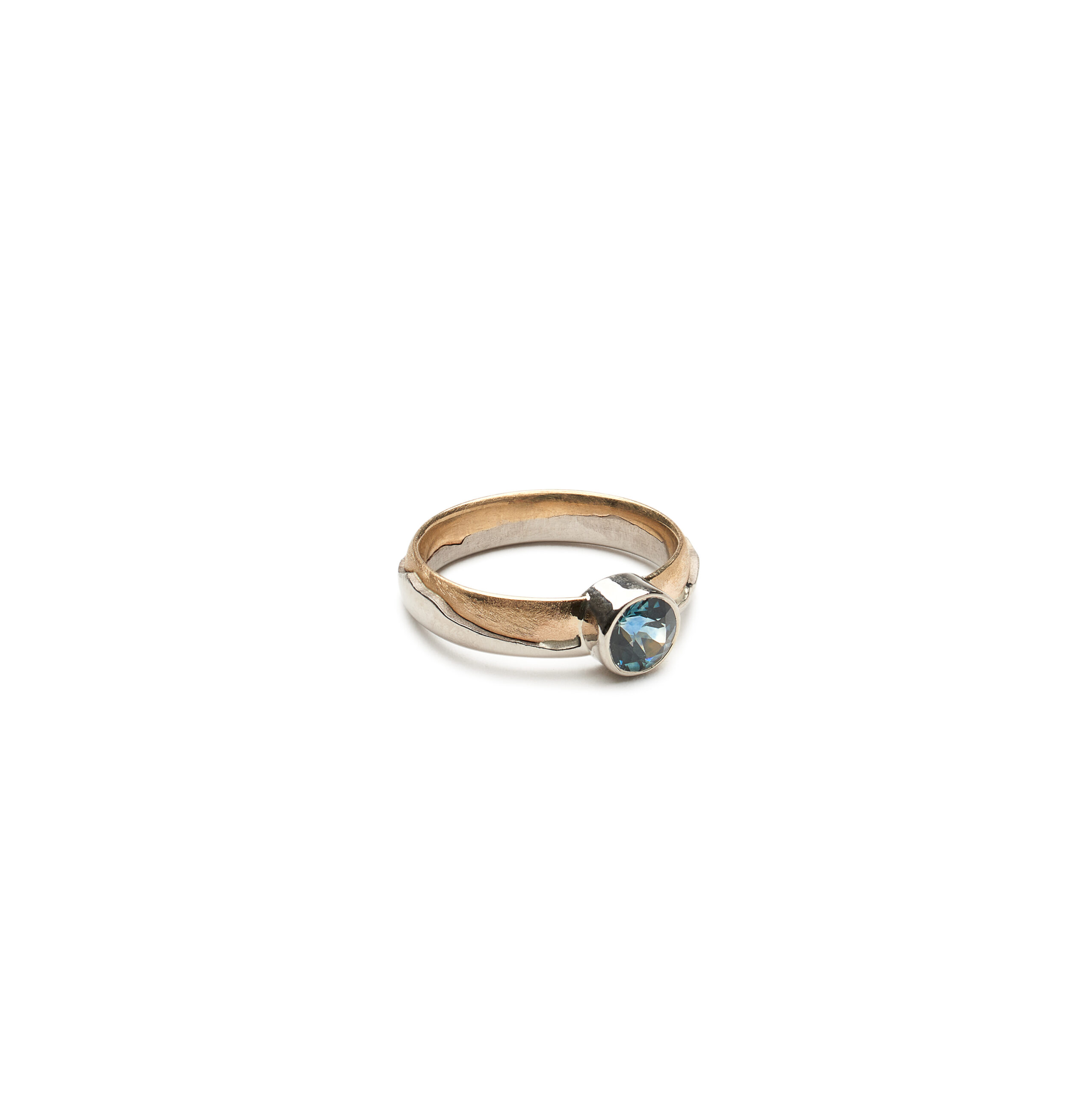 Dual metal gold ring with blue gemstone